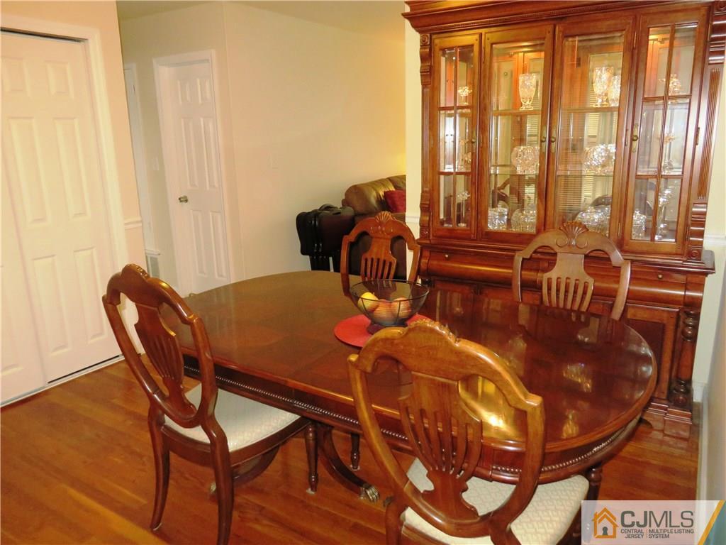 213 Princeton Road Old Bridge, NJ 08859 - Photo 5 of 17 a dining room with furniture and wooden floor