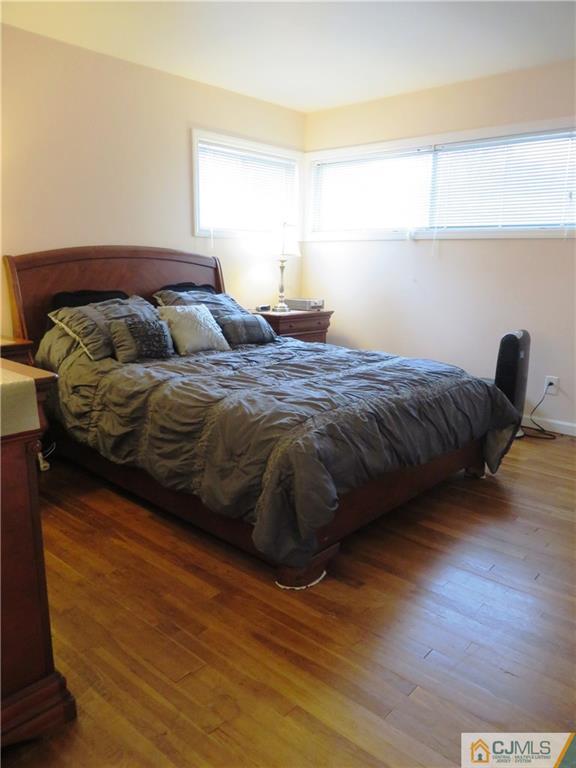 213 Princeton Road Old Bridge, NJ 08859 - Photo 8 of 17 a bedroom with a bed and window