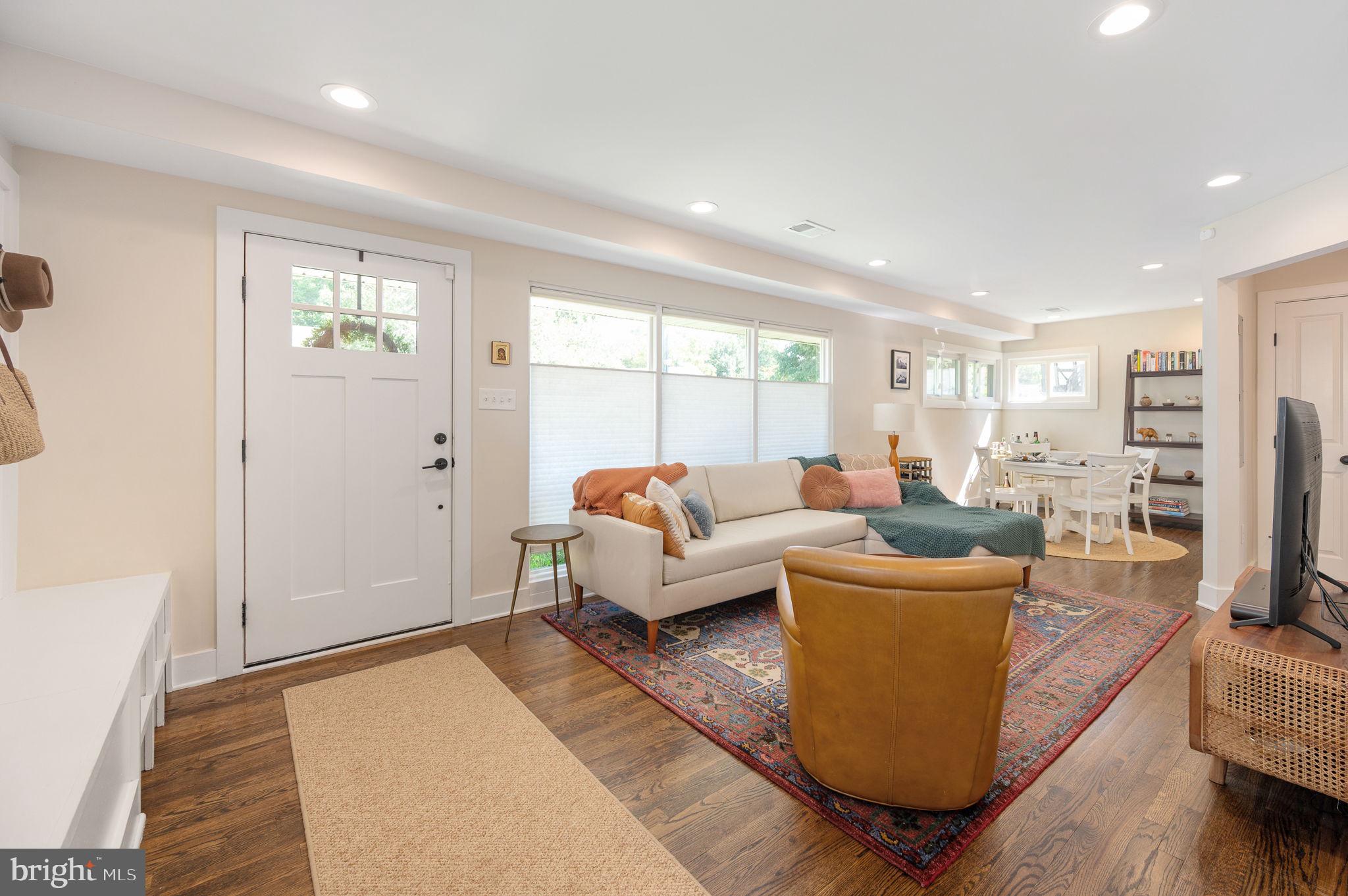 living dining area with solid wood floors
