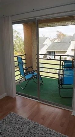 a view of a two chair in the porch