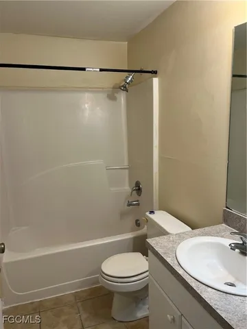 a bathroom with a sink a toilet and a bathtub