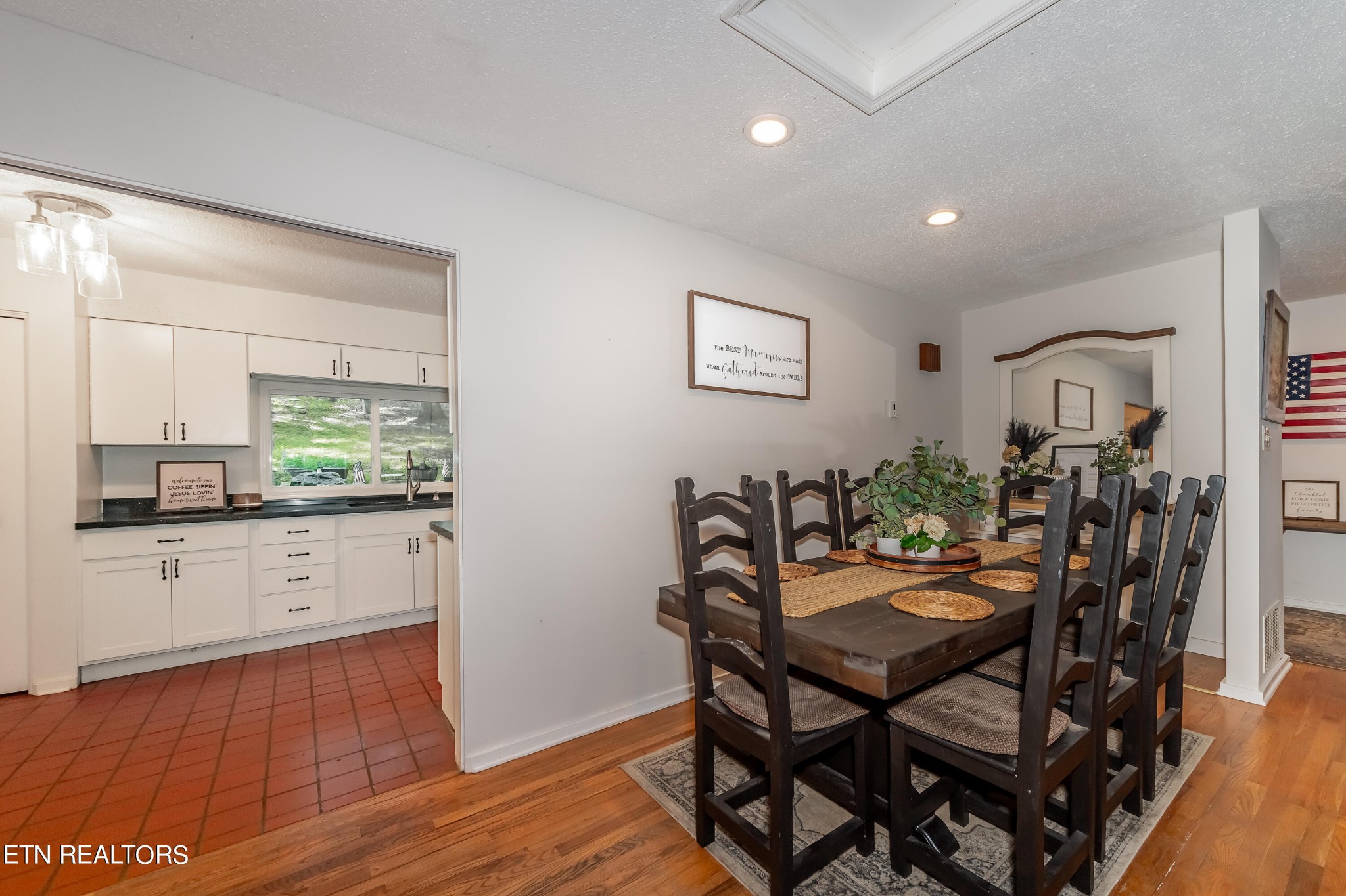 907 West Outer Drive Oak Ridge, TN 37830 - Photo 19 of 42 a view of a dining room with furniture and wooden floor