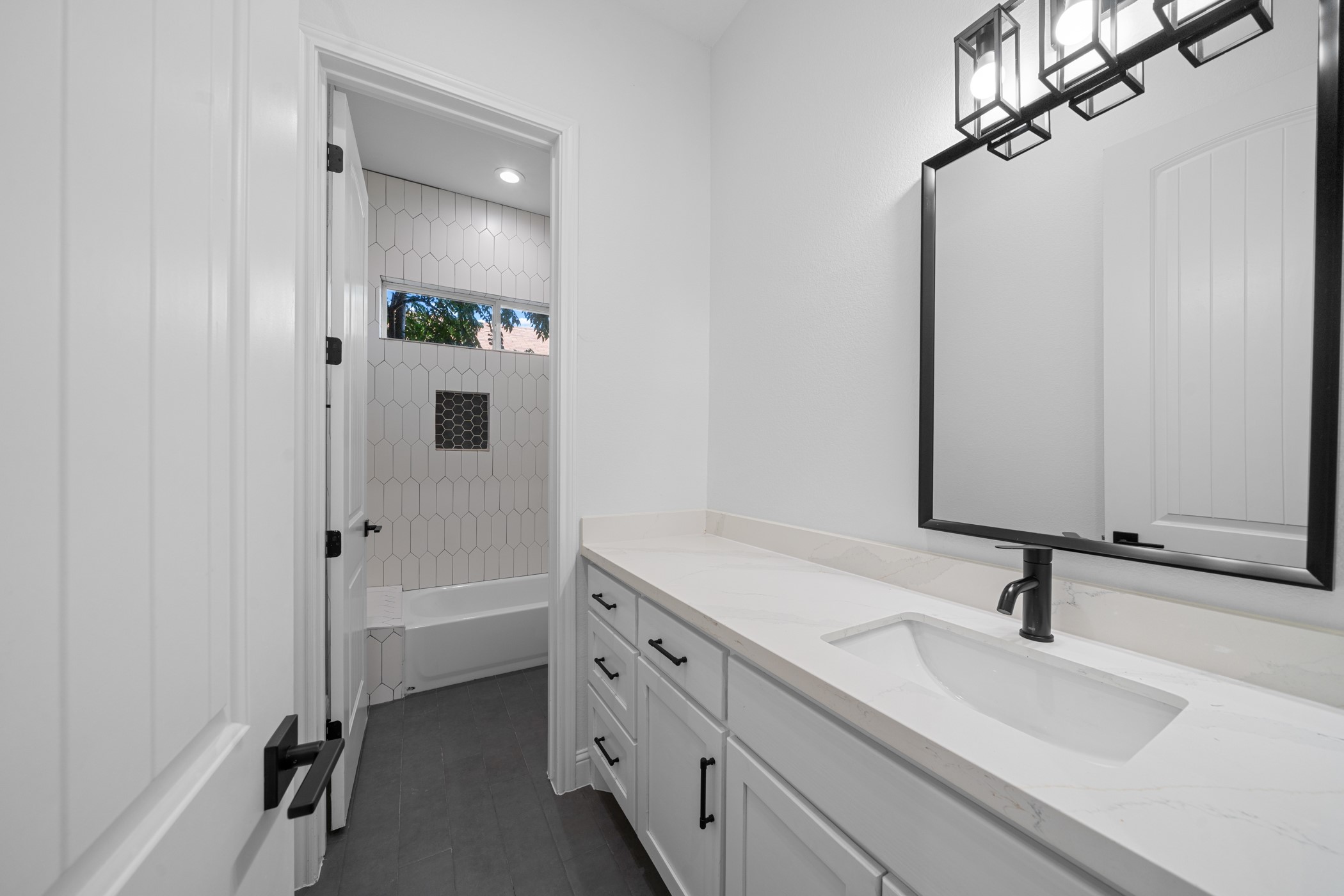 2303 Wipprecht Street Houston, TX 77020 - Photo 13 of 26 a bathroom with a sink double vanity and a mirror