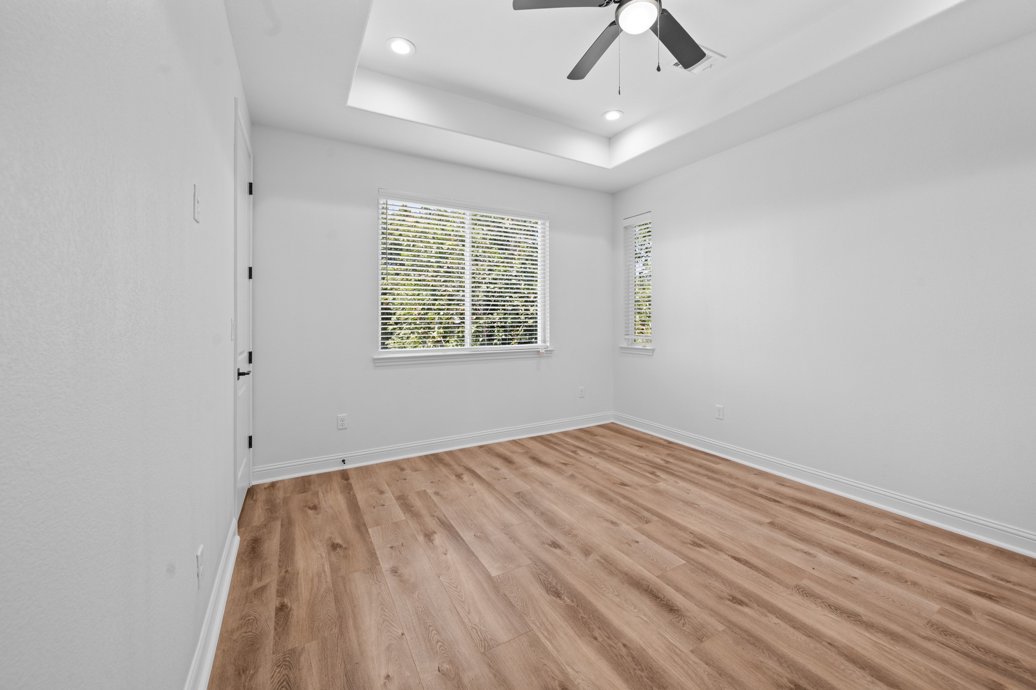 2303 Wipprecht Street Houston, TX 77020 - Photo 15 of 26 wooden floor in an empty room with a window