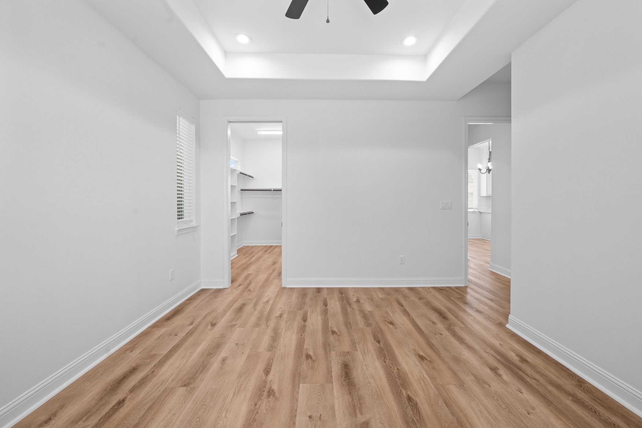 2303 Wipprecht Street Houston, TX 77020 - Photo 16 of 26 a view of empty room with wooden floor and fan
