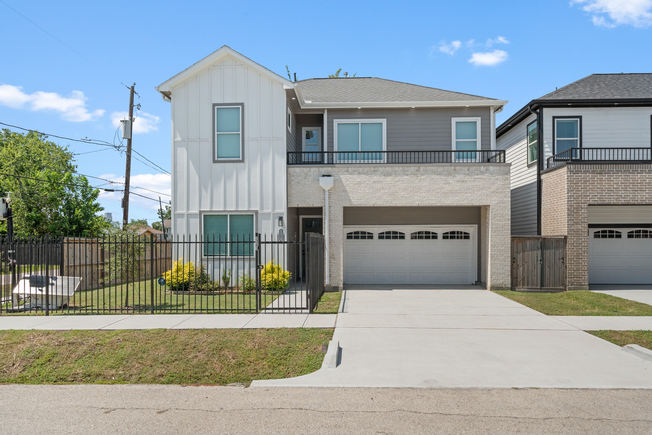 2303 Wipprecht Street Houston, TX 77020 - Photo 24 of 26 a view of a house with a swimming pool and a yard