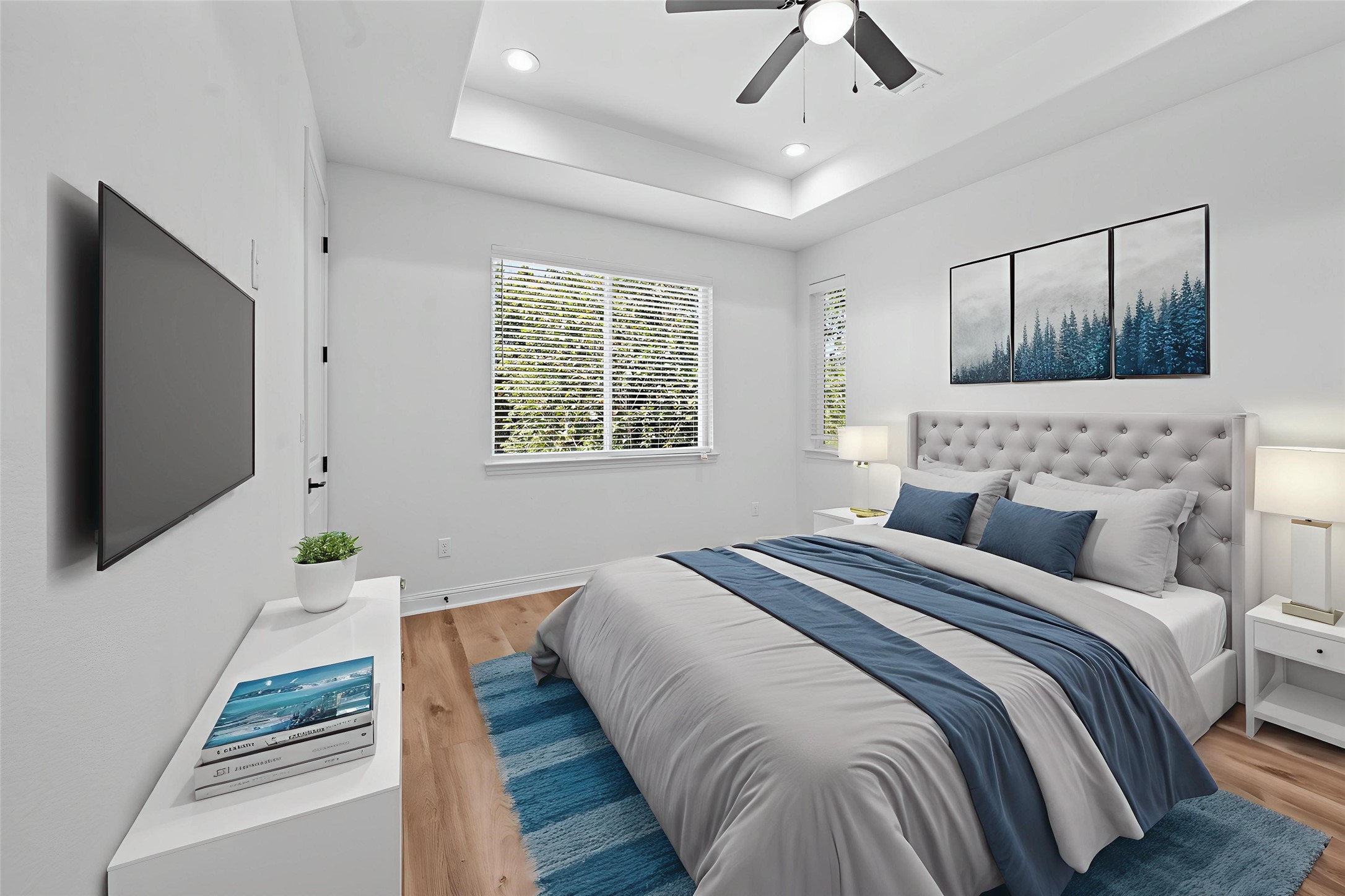 2303 Wipprecht Street Houston, TX 77020 - Photo 4 of 26 a bedroom with a bed and a flat screen tv