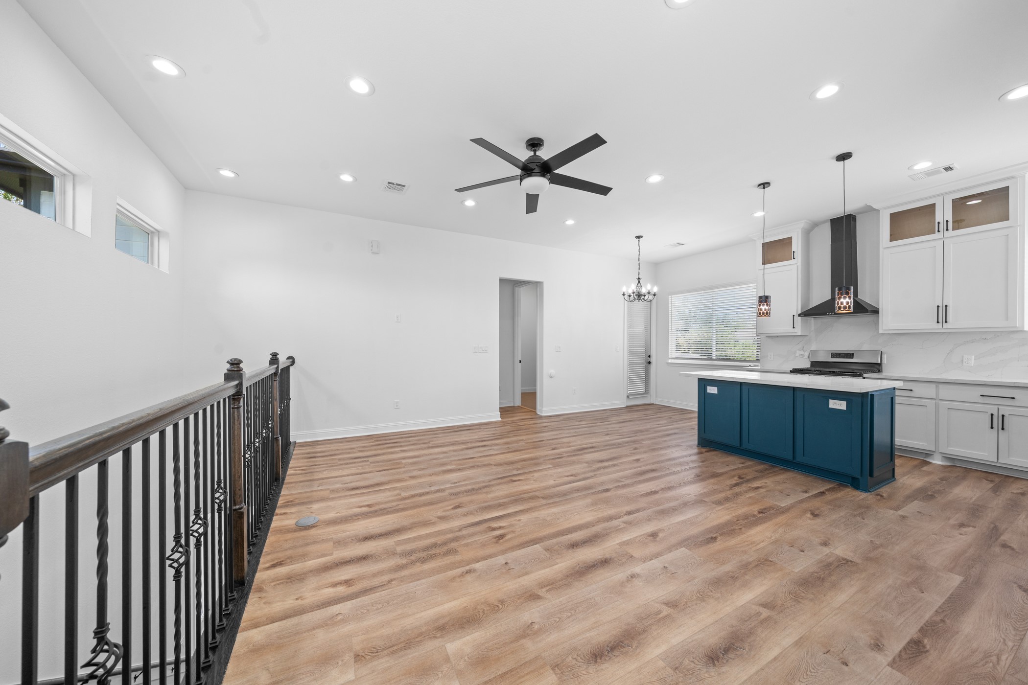 2303 Wipprecht Street Houston, TX 77020 - Photo 5 of 26 a large kitchen with stainless steel appliances kitchen island granite countertop a stove a refrigerator a sink and a oven