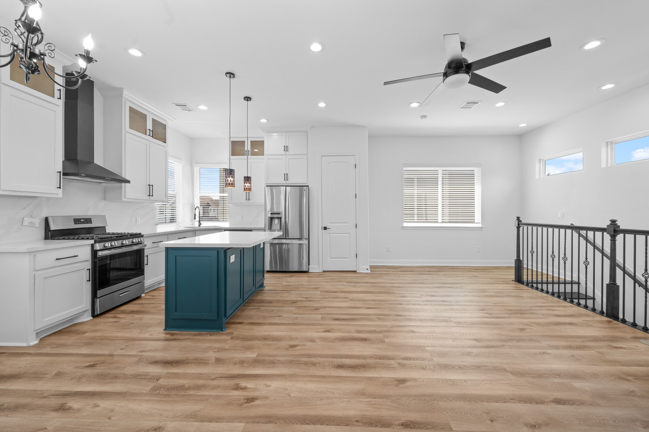 2303 Wipprecht Street Houston, TX 77020 - Photo 8 of 26 a kitchen with kitchen island a sink stainless steel appliances and cabinets