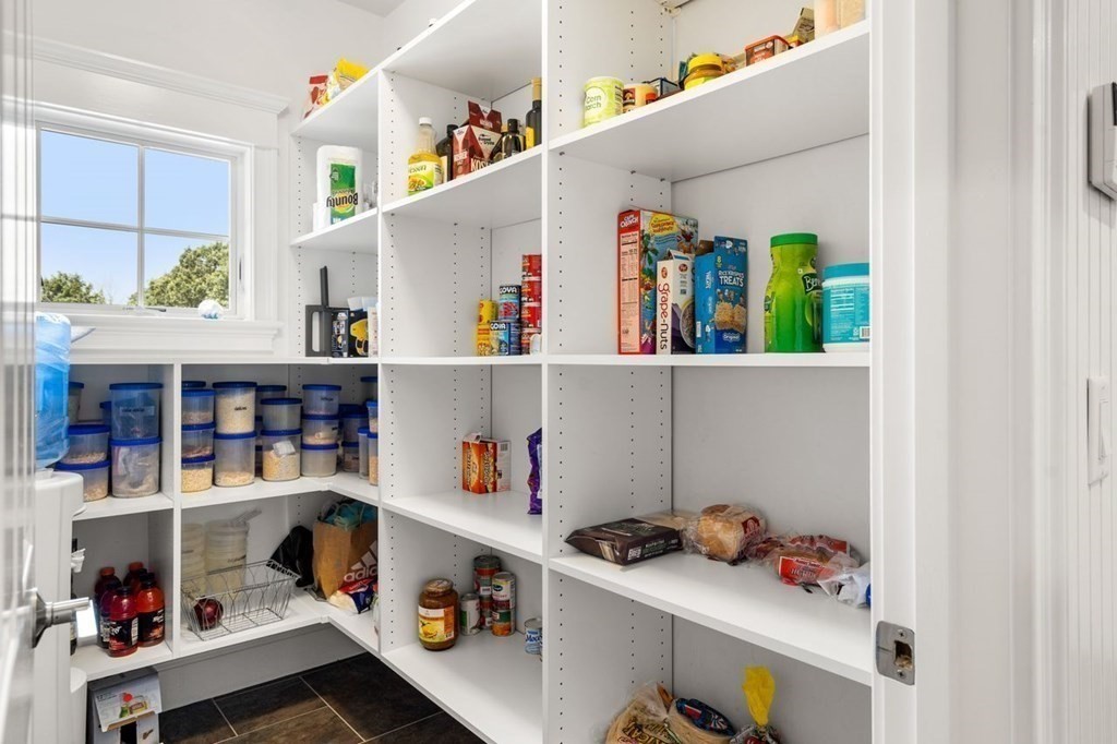 1663 Lowell Road Concord, MA 01742 - Photo 13 of 41 a room with storage and utility