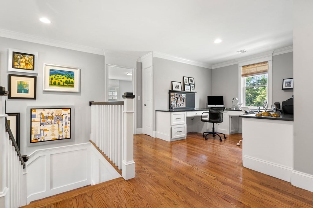 1663 Lowell Road Concord, MA 01742 - Photo 18 of 41 a living room with furniture and a flat screen tv