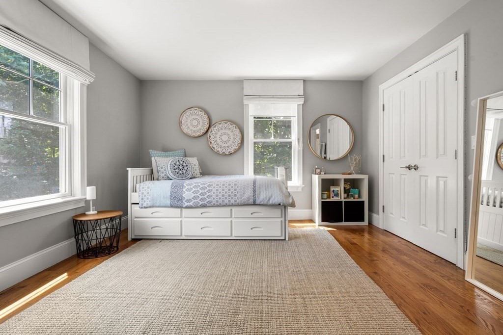 1663 Lowell Road Concord, MA 01742 - Photo 19 of 41 a living room with furniture and a fireplace