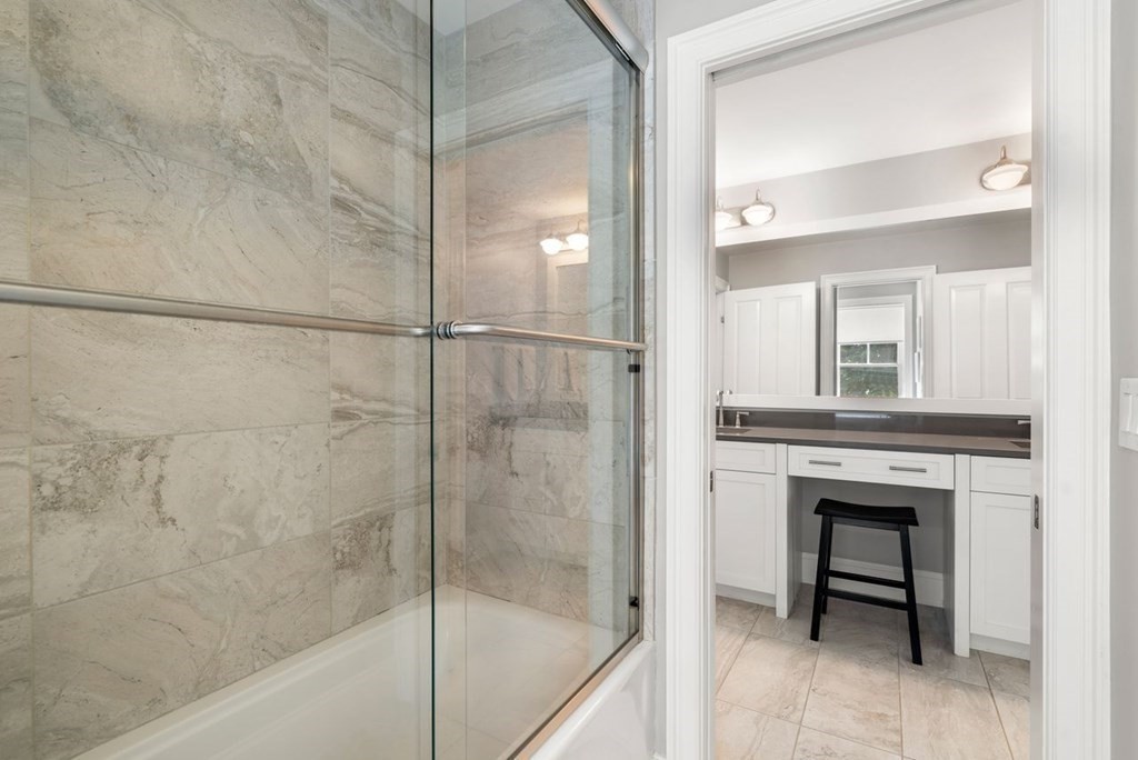 1663 Lowell Road Concord, MA 01742 - Photo 20 of 41 a bathroom with a bathtub and a shower