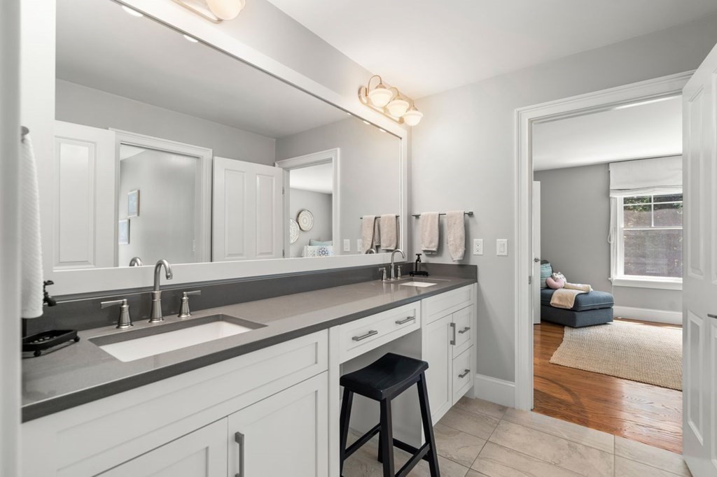 1663 Lowell Road Concord, MA 01742 - Photo 21 of 41 a bathroom with a sink double vanity