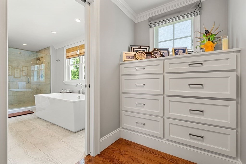 1663 Lowell Road Concord, MA 01742 - Photo 27 of 41 a view of a dresser with wooden floor