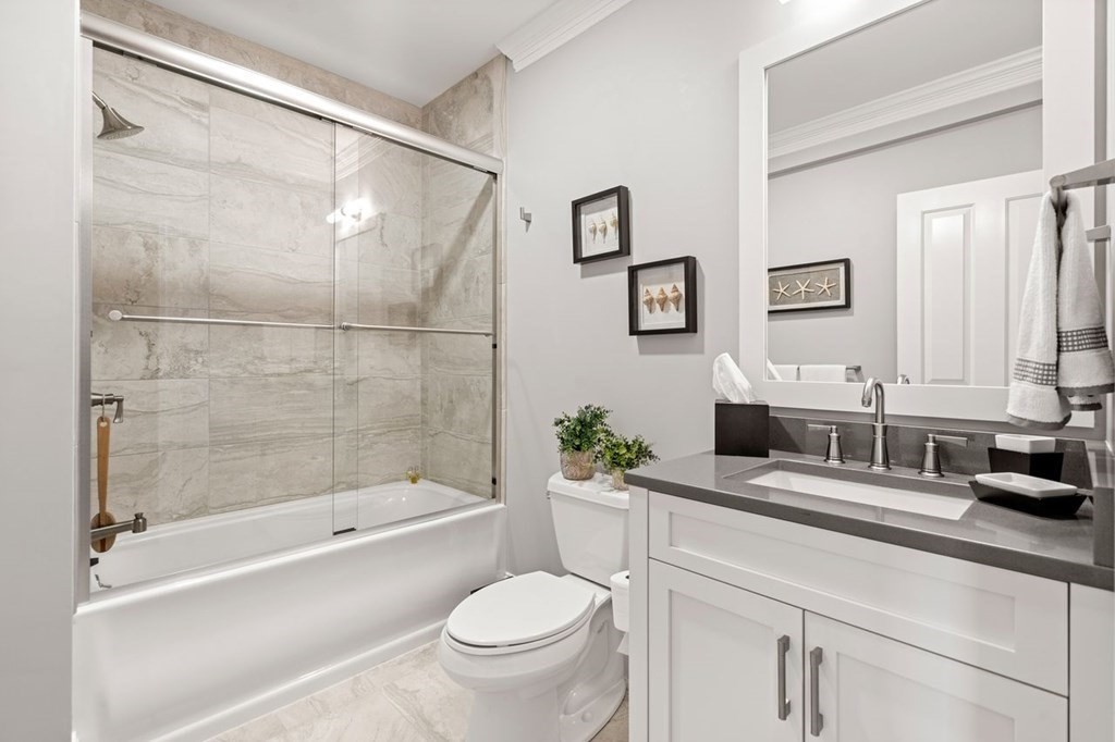 1663 Lowell Road Concord, MA 01742 - Photo 32 of 41 a bathroom with a sink toilet and shower