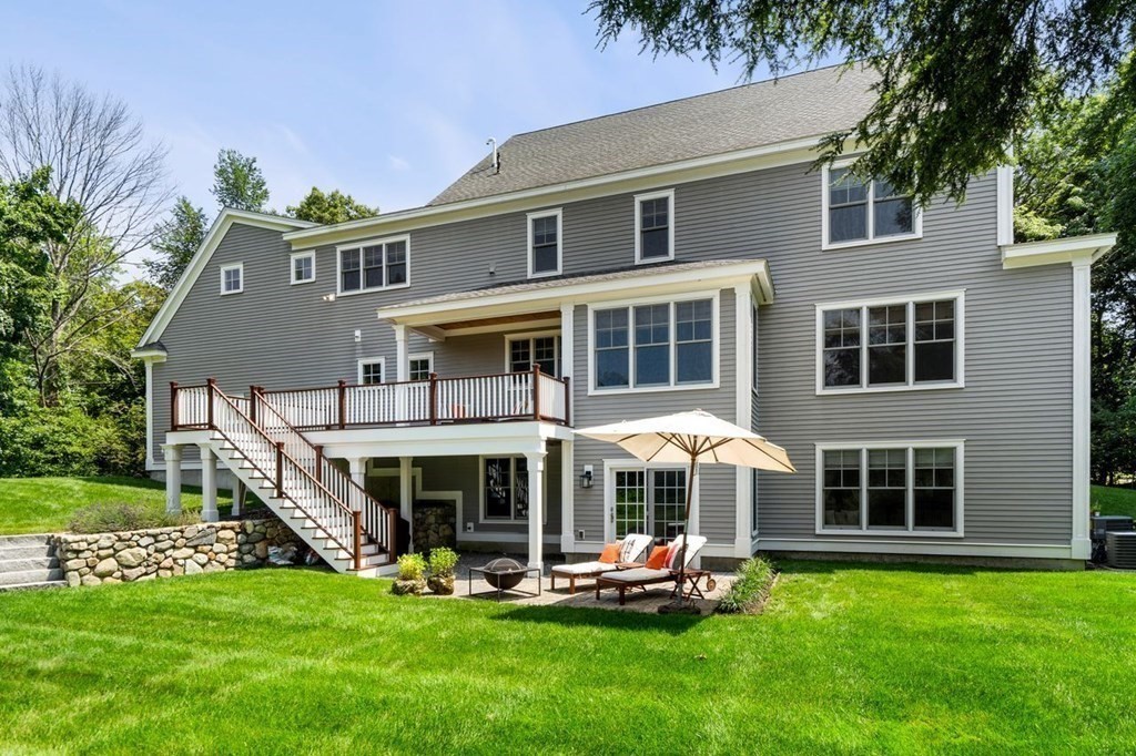 1663 Lowell Road Concord, MA 01742 - Photo 37 of 41 a front view of a house with garden