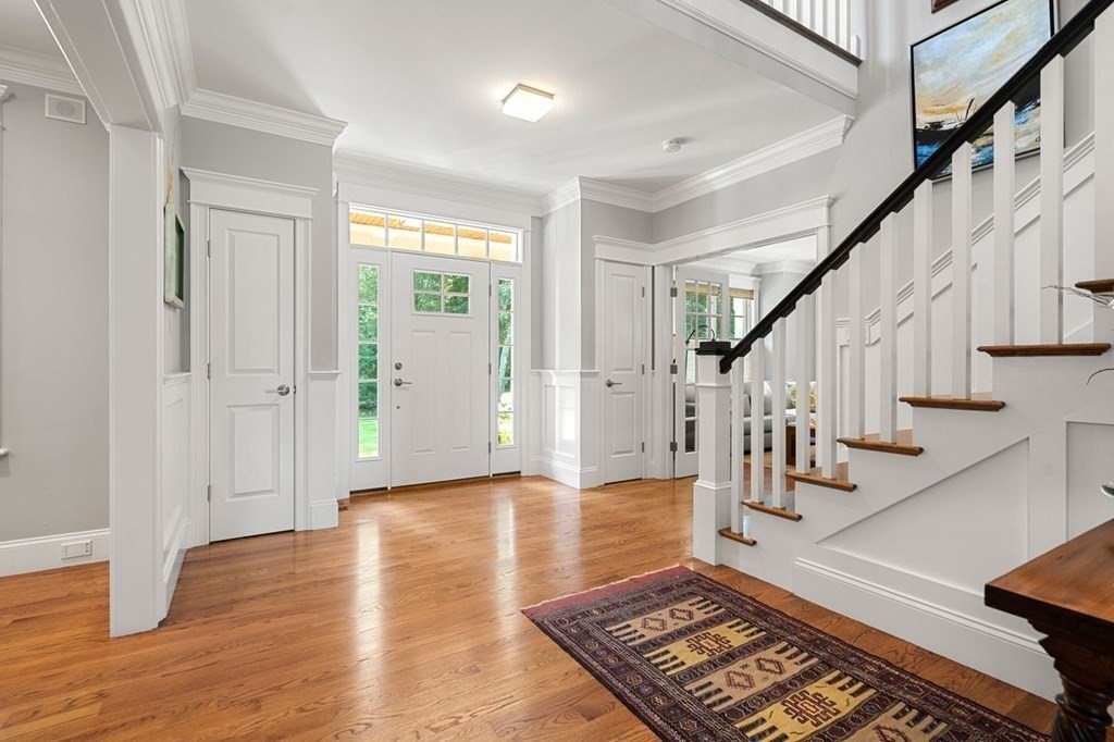 1663 Lowell Road Concord, MA 01742 - Photo 4 of 41 a view of an entryway with wooden floor
