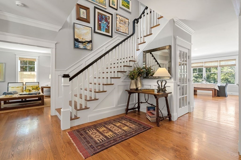 1663 Lowell Road Concord, MA 01742 - Photo 5 of 41 a view of entryway livingroom and hall with wooden floor