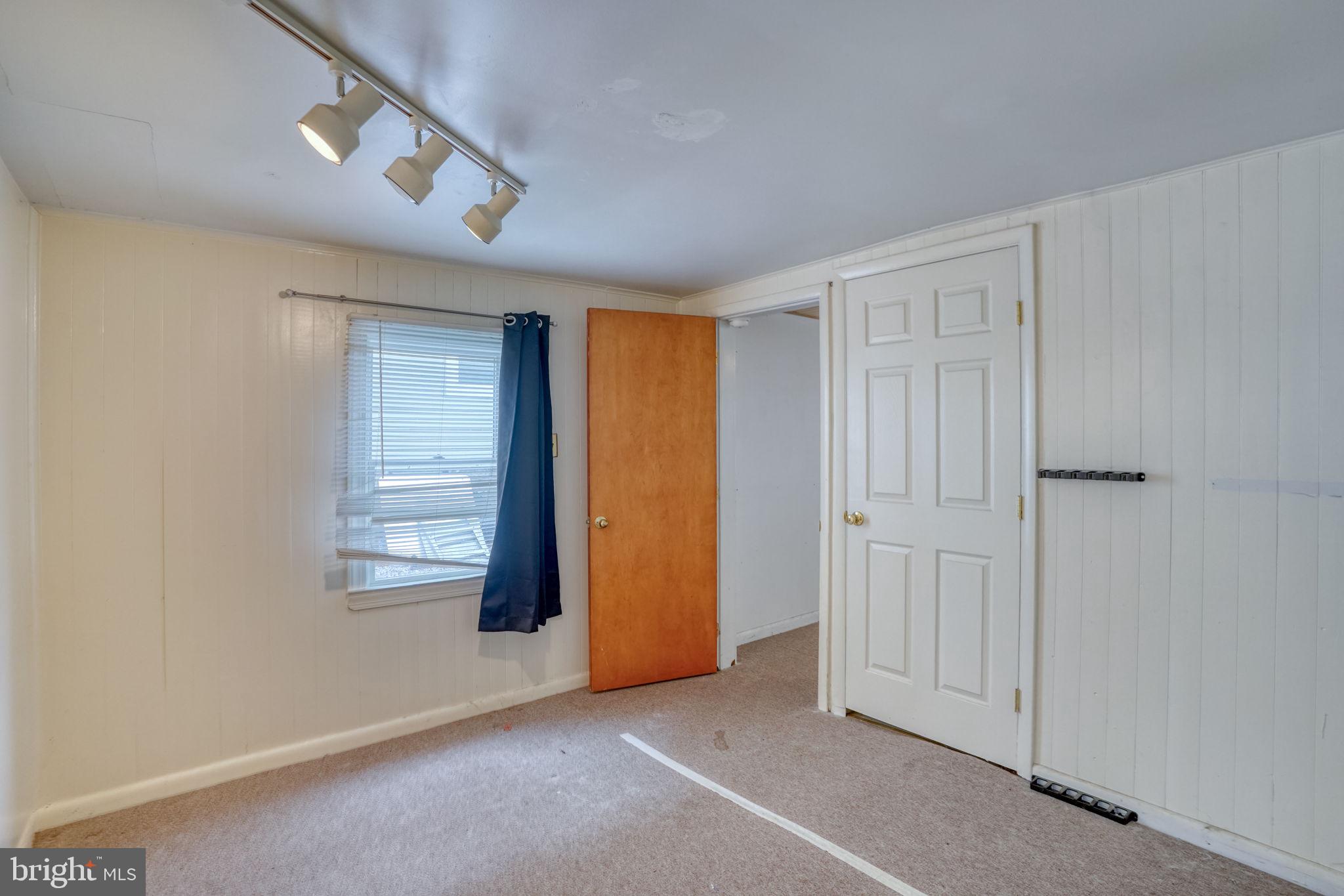257 Front Street Leipsic, DE 19901 - Photo 20 of 37 an empty room with windows