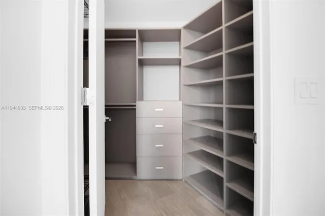 a lobby with furniture and window