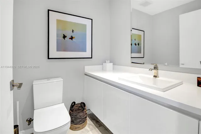 a outdoor patio with swimming pool table and chairs