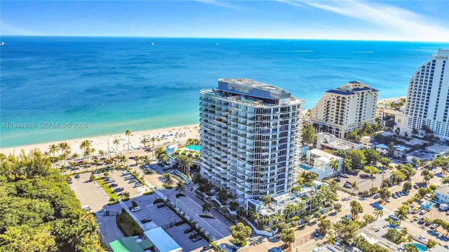 a view of a bathroom with a tub and shower