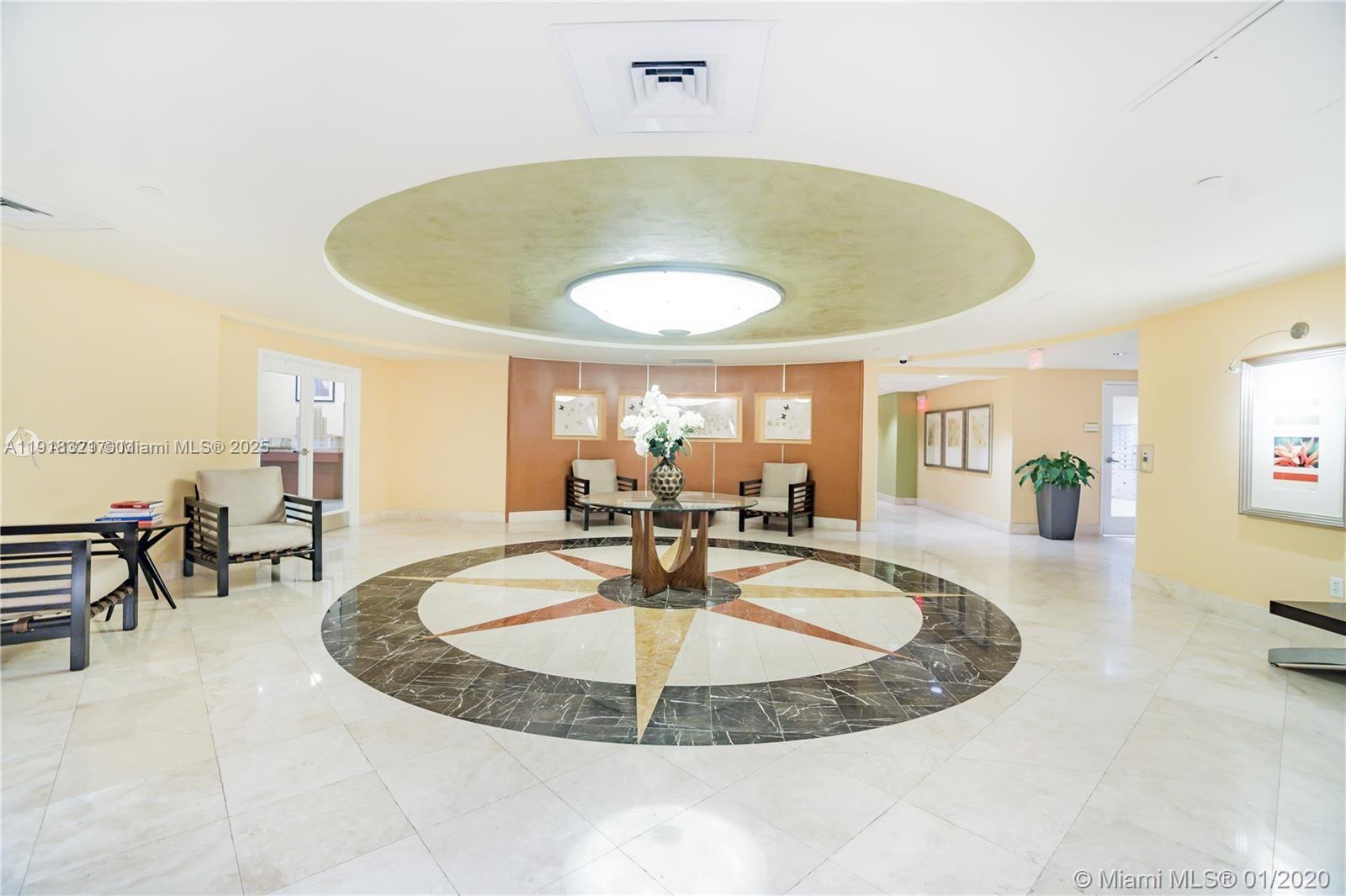 7350 Southwest 89th Street, Unit 408S Miami, FL 33156 - Photo 12 of 19 a view of a swimming pool with dining table and chairs