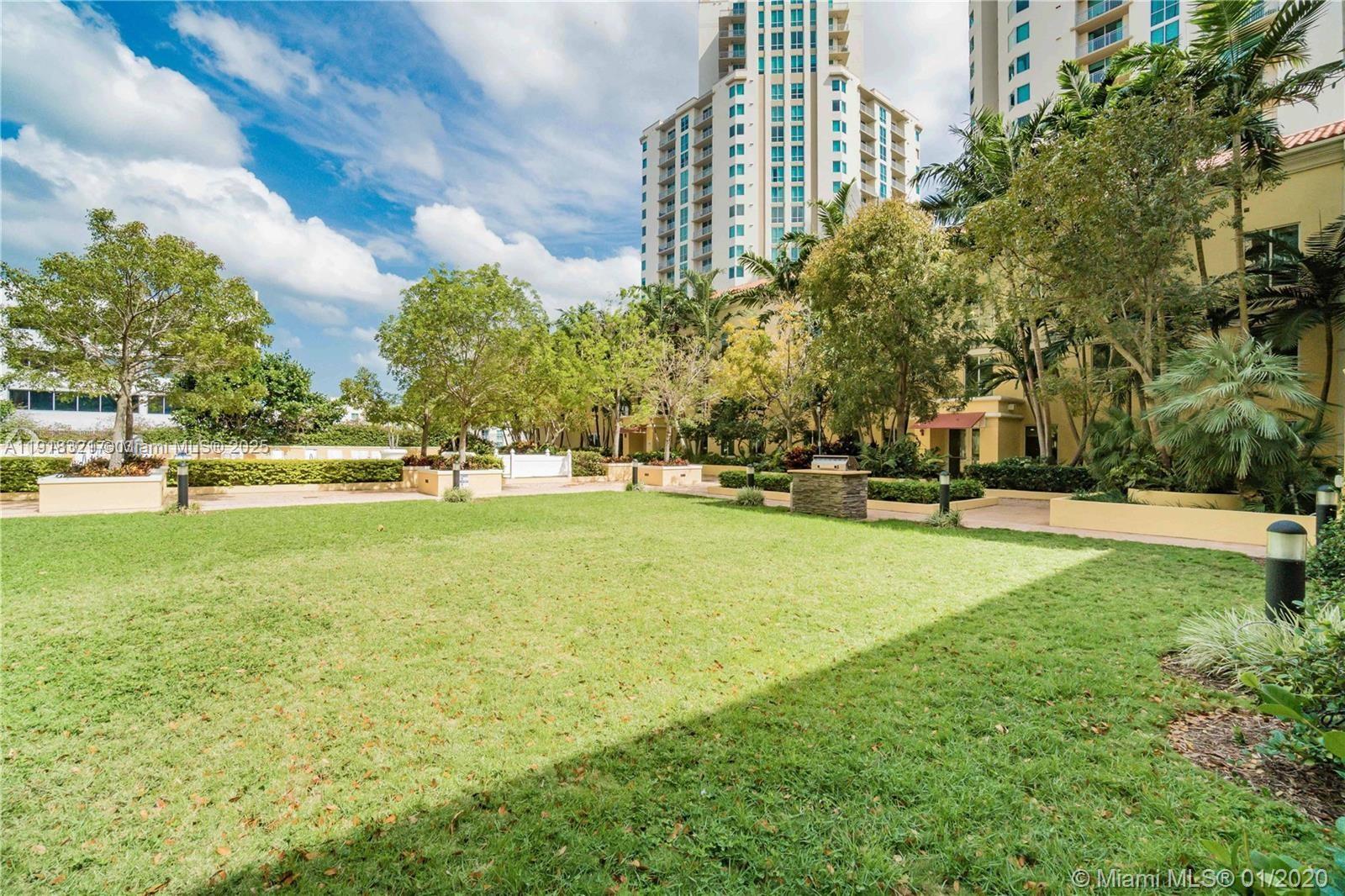7350 Southwest 89th Street, Unit 408S Miami, FL 33156 - Photo 14 of 19 a view of outdoor space yard and trees