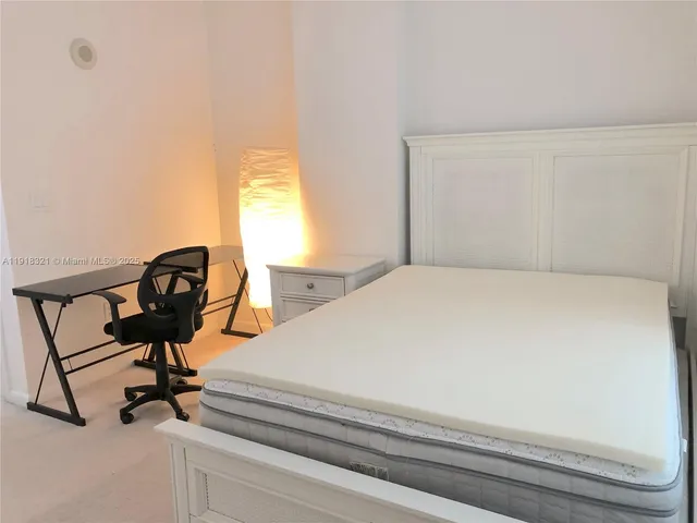 a room with cabinets and a window