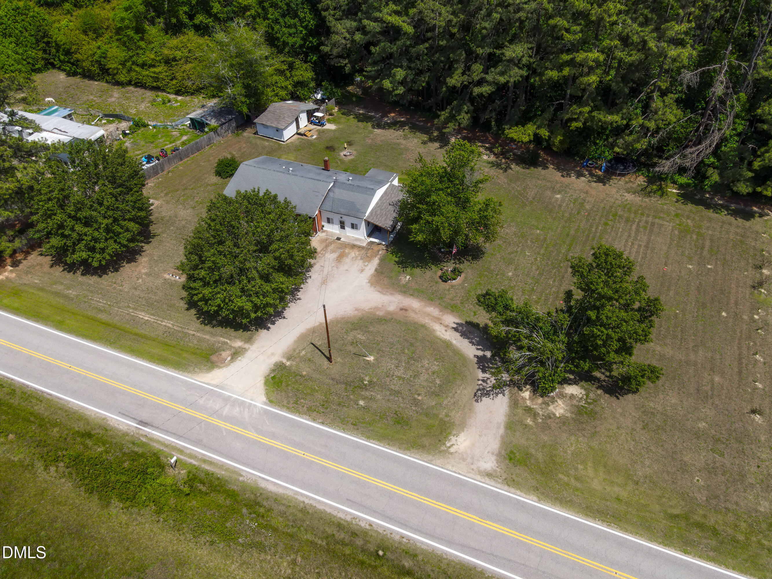 4967 Highway 581 Spring Hope, NC 27882 - Photo 41 of 44 an aerial view of residential houses with outdoor space