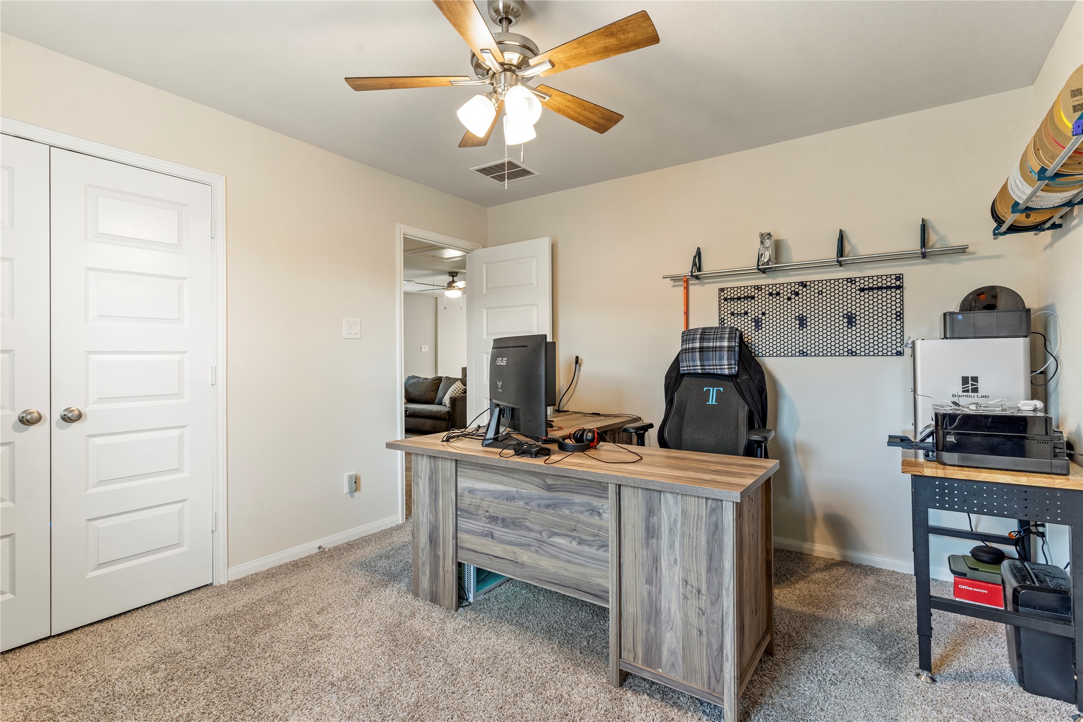 2019 Myrtle Oak Street Conroe, TX 77304 - Photo 18 of 23 a view of a workspace with furniture