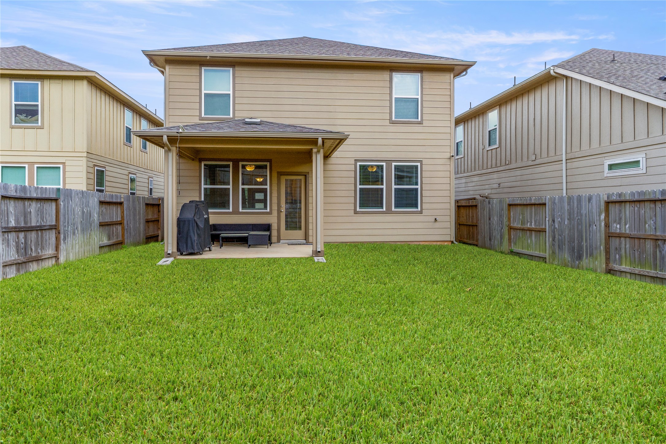 2019 Myrtle Oak Street Conroe, TX 77304 - Photo 21 of 23 a view of a house with backyard