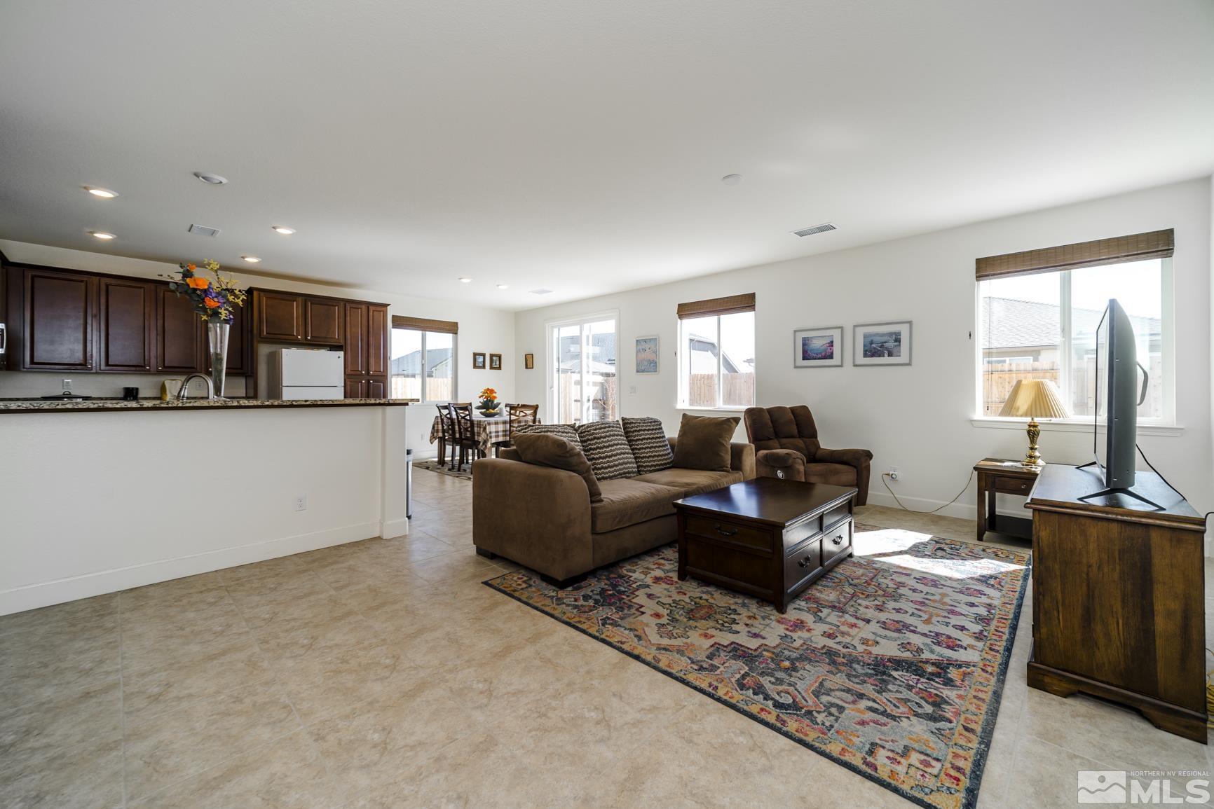 6758 Eagle Peak Drive Carson City, NV 89701 - Photo 7 of 28 a living room with furniture and a window