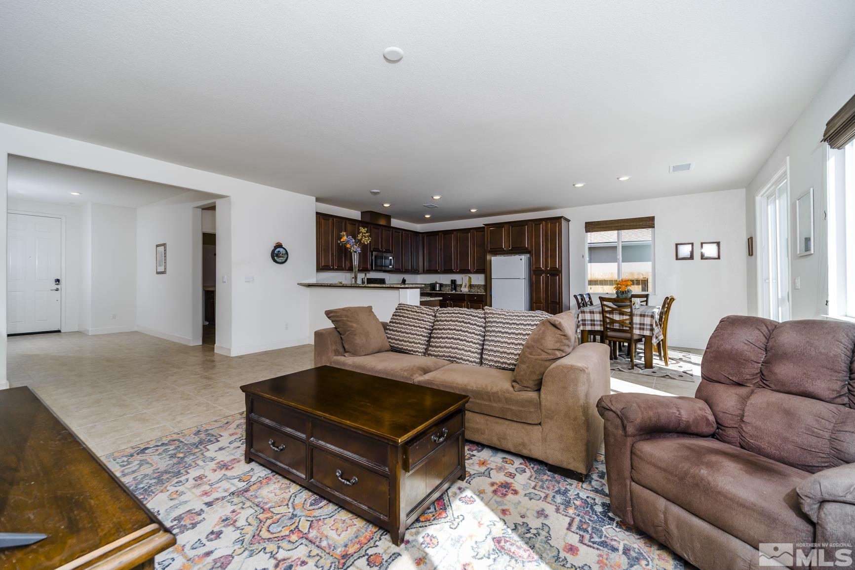 6758 Eagle Peak Drive Carson City, NV 89701 - Photo 8 of 28 a living room with furniture and wooden floor