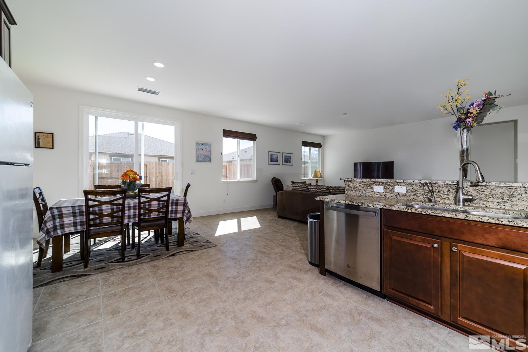 6758 Eagle Peak Drive Carson City, NV 89701 - Photo 9 of 28 a view of a dining room with furniture