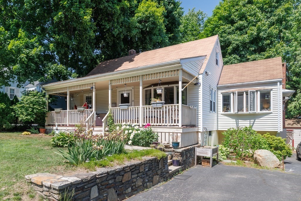 110 Chester Street Worcester, MA 01605 - Photo 1 of 19 front view of a house with a yard