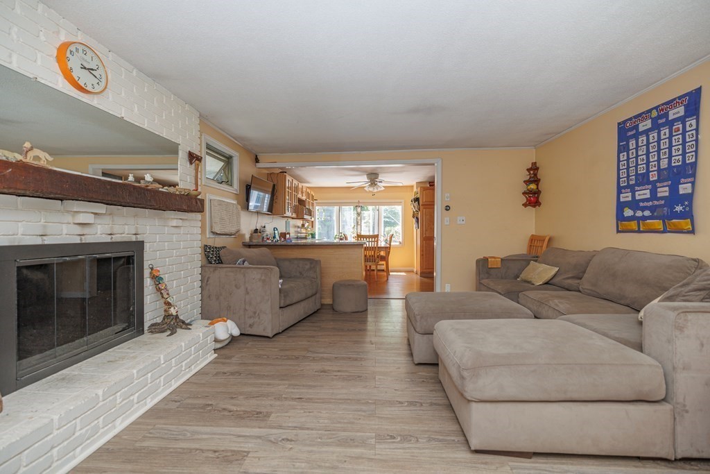 110 Chester Street Worcester, MA 01605 - Photo 10 of 19 a living room with furniture and a fireplace