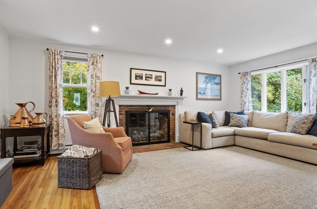 45 Walnut Road Hamilton, MA 01982 - Photo 11 of 40 a living room with furniture and a fireplace