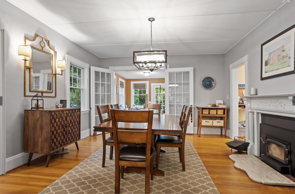 45 Walnut Road Hamilton, MA 01982 - Photo 15 of 40 a dining room with furniture a chandelier and wooden floor