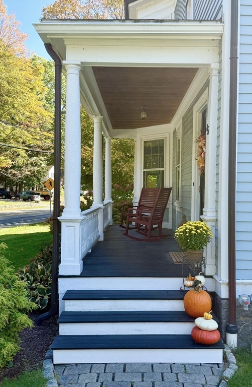 45 Walnut Road Hamilton, MA 01982 - Photo 2 of 40 a front view of a house with outdoor seating and garden