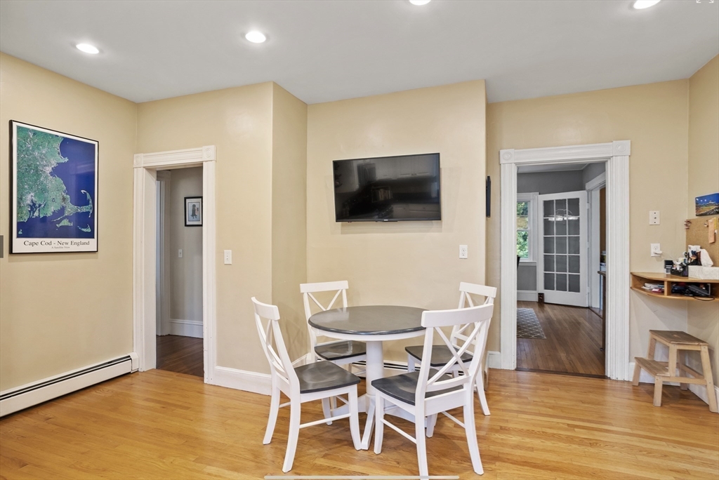 45 Walnut Road Hamilton, MA 01982 - Photo 5 of 40 a view of a livingroom with furniture and a flat screen tv