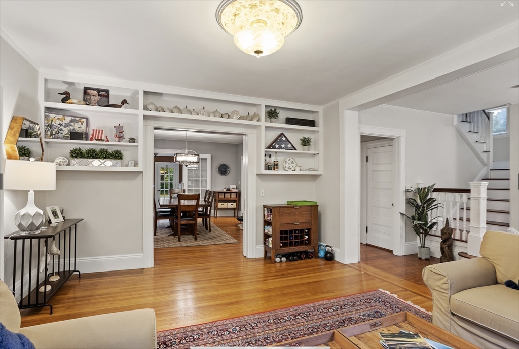 45 Walnut Road Hamilton, MA 01982 - Photo 10 of 40 a living room with furniture and a chandelier