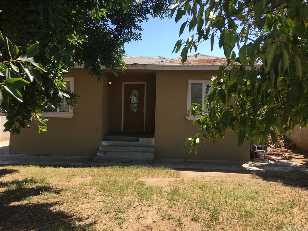 2994-2996 9th Street Riverside, CA 92507 - Photo 1 of 1 a front view of a house with a yard