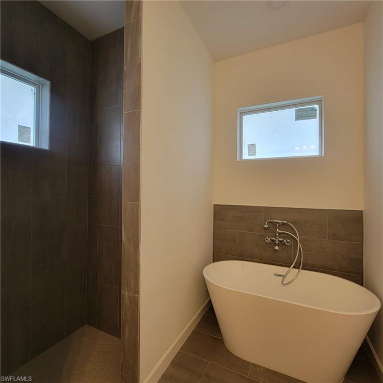 1900 West 16th Street Lehigh Acres, FL 33972 - Photo 14 of 21 a bathroom with a sink