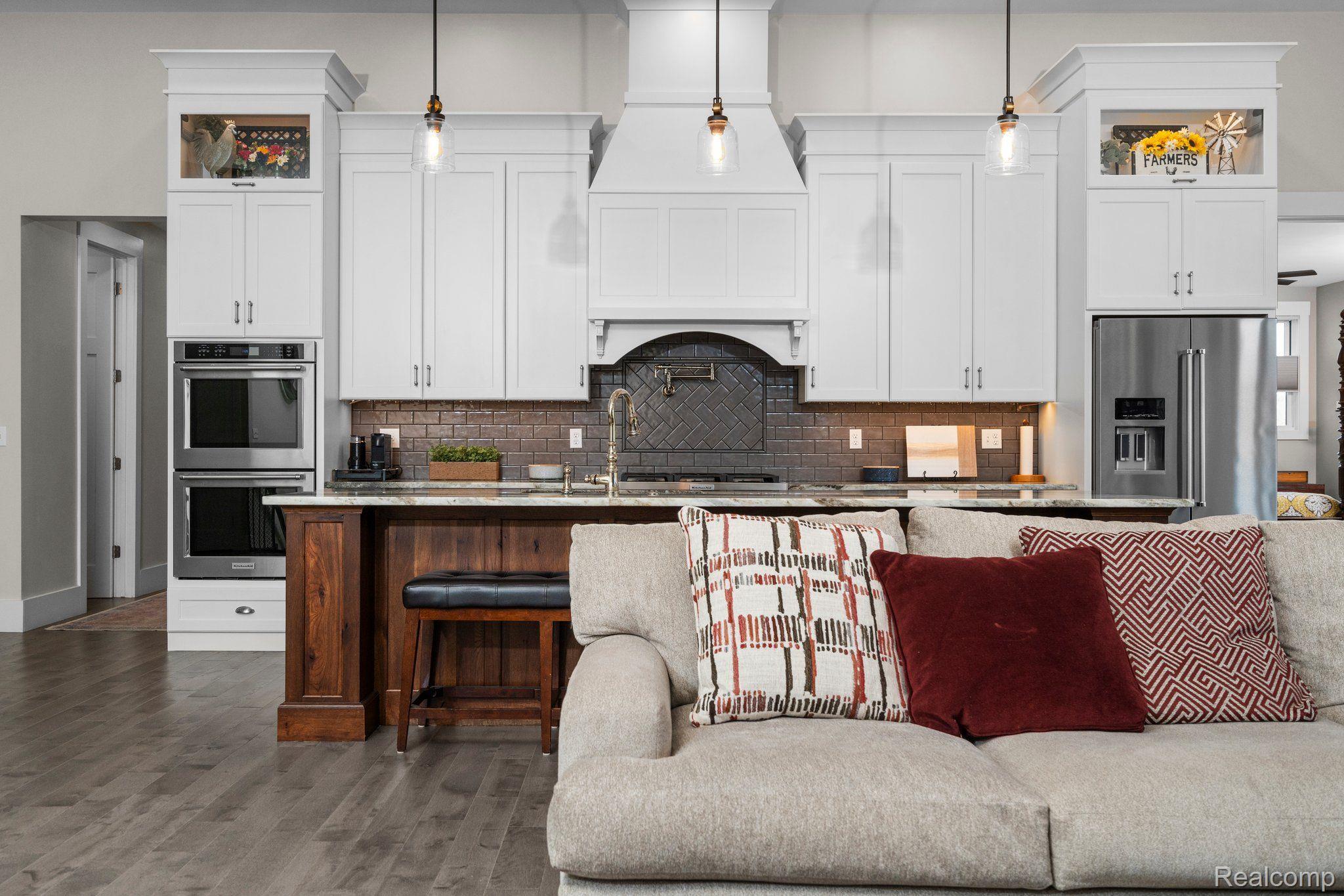5057 Pardee Road East Webberville, MI 48892 - Photo 9 of 78 Staggard cupboards and high-end finishes are a +