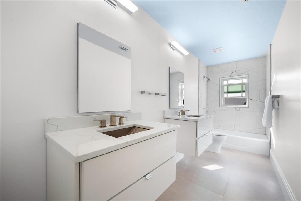 1746 Stapleton Street Sarasota, FL 34239 - Photo 42 of 77 Upstairs 2nd Bathroom with Tub/Shower