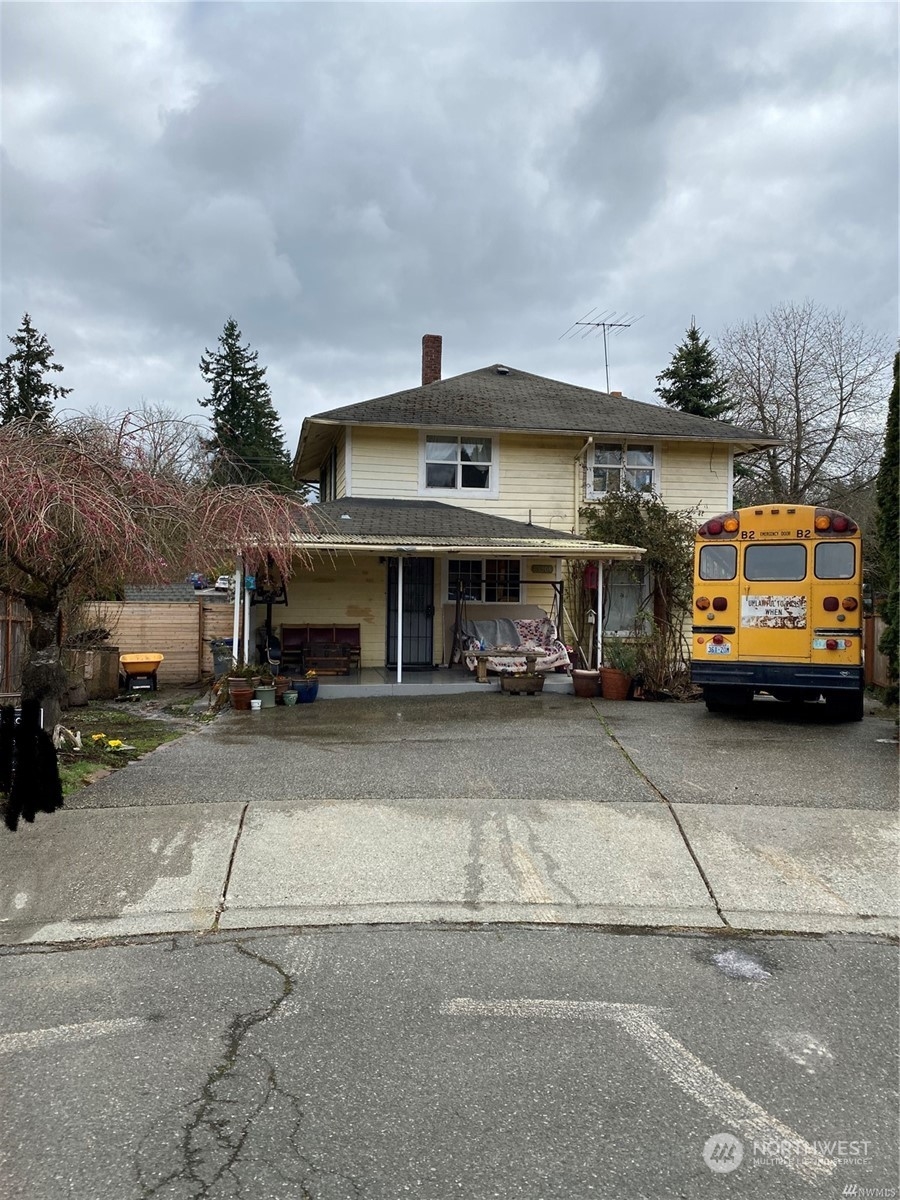 23304 Bothell Everett Highway Bothell, WA 98021 - Photo 2 of 35 a view of a car parked in front of a building