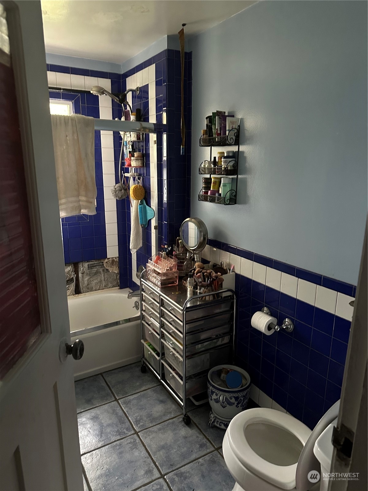 23304 Bothell Everett Highway Bothell, WA 98021 - Photo 22 of 35 a living room with furniture and a rug
