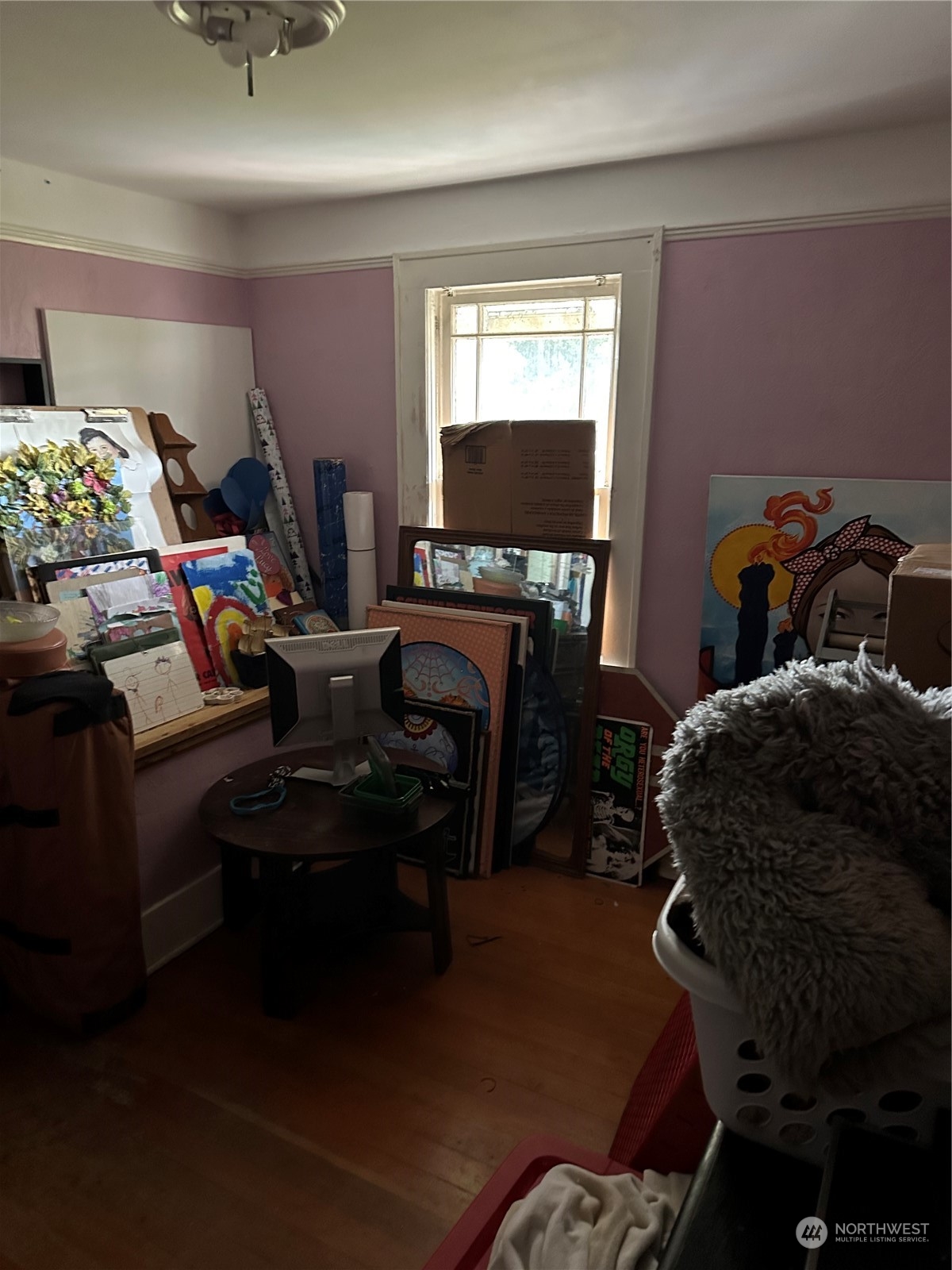 23304 Bothell Everett Highway Bothell, WA 98021 - Photo 24 of 35 a bedroom with furniture and a flat screen tv